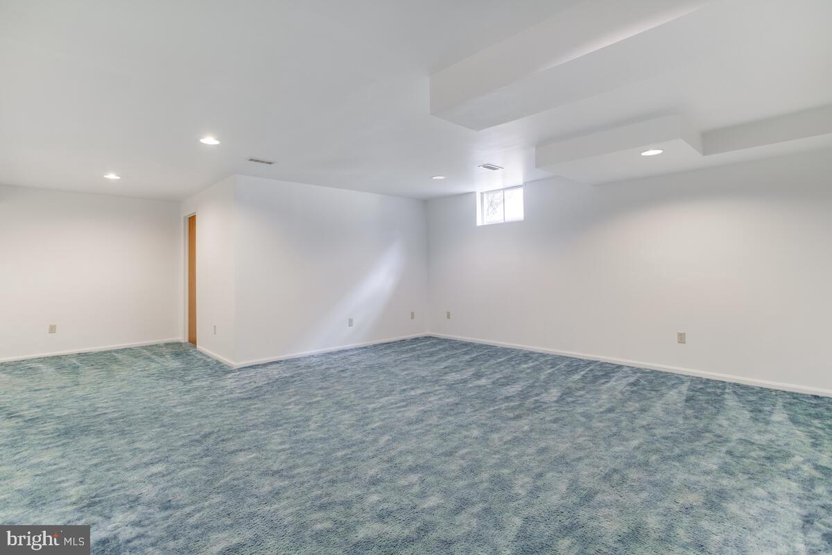 14226 Summit Lane Laurel, MD 20708 - Photo 33 of 58 Lower level family room
