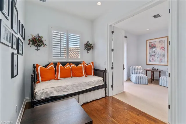 a bedroom with furniture and a couch