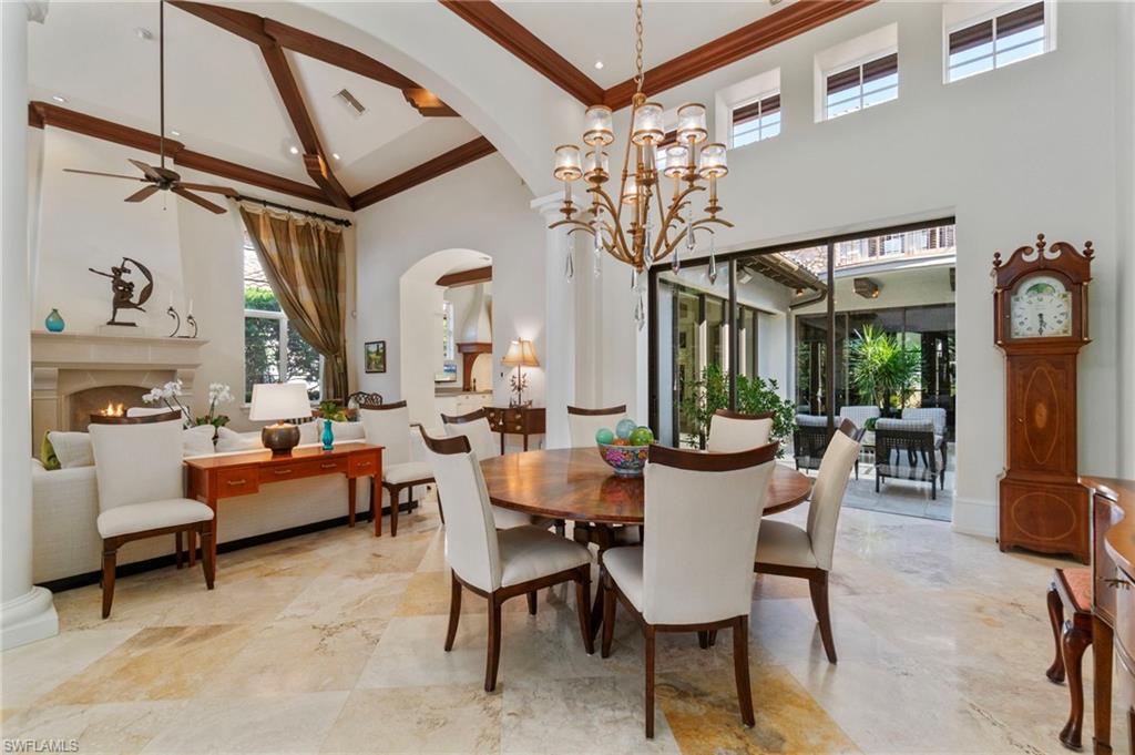 29150 Positano Lane Naples, FL 34110 - Photo 4 of 50 a view of a dining room with furniture window and outside view