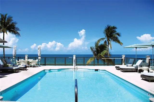 a view of a patio with swimming pool