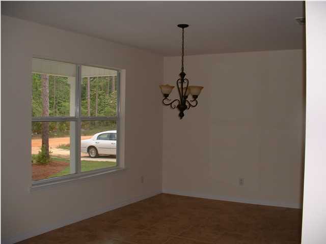 119 North 3rd Street Santa Rosa Beach, FL 32459 - Photo 8 of 18 a view of empty room with windows