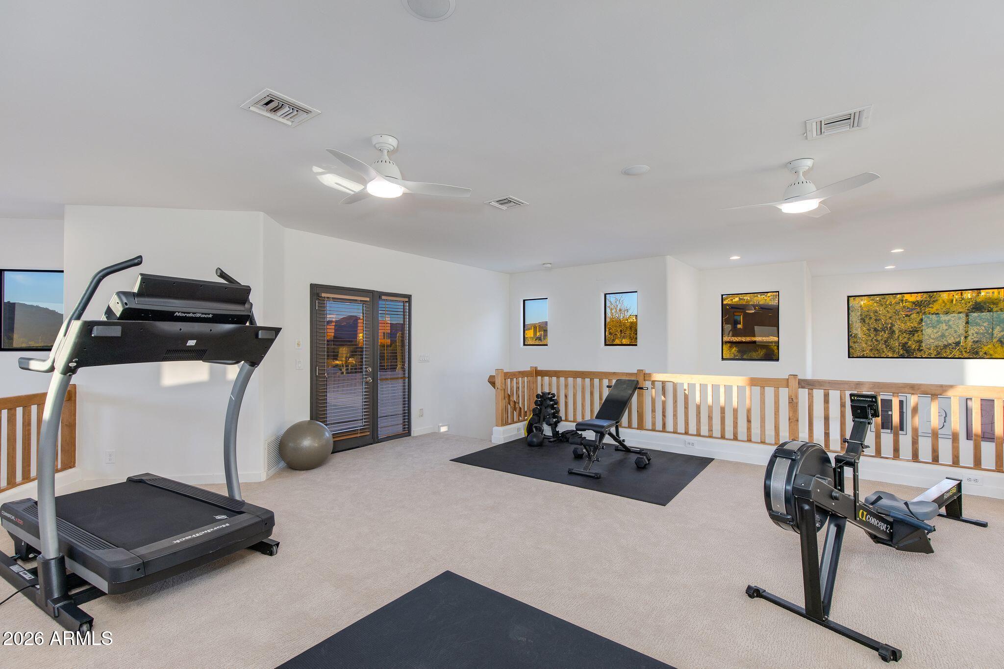 5901 East Restin Road Cave Creek, AZ 85331 - Photo 52 of 101 a living room with furniture and a window