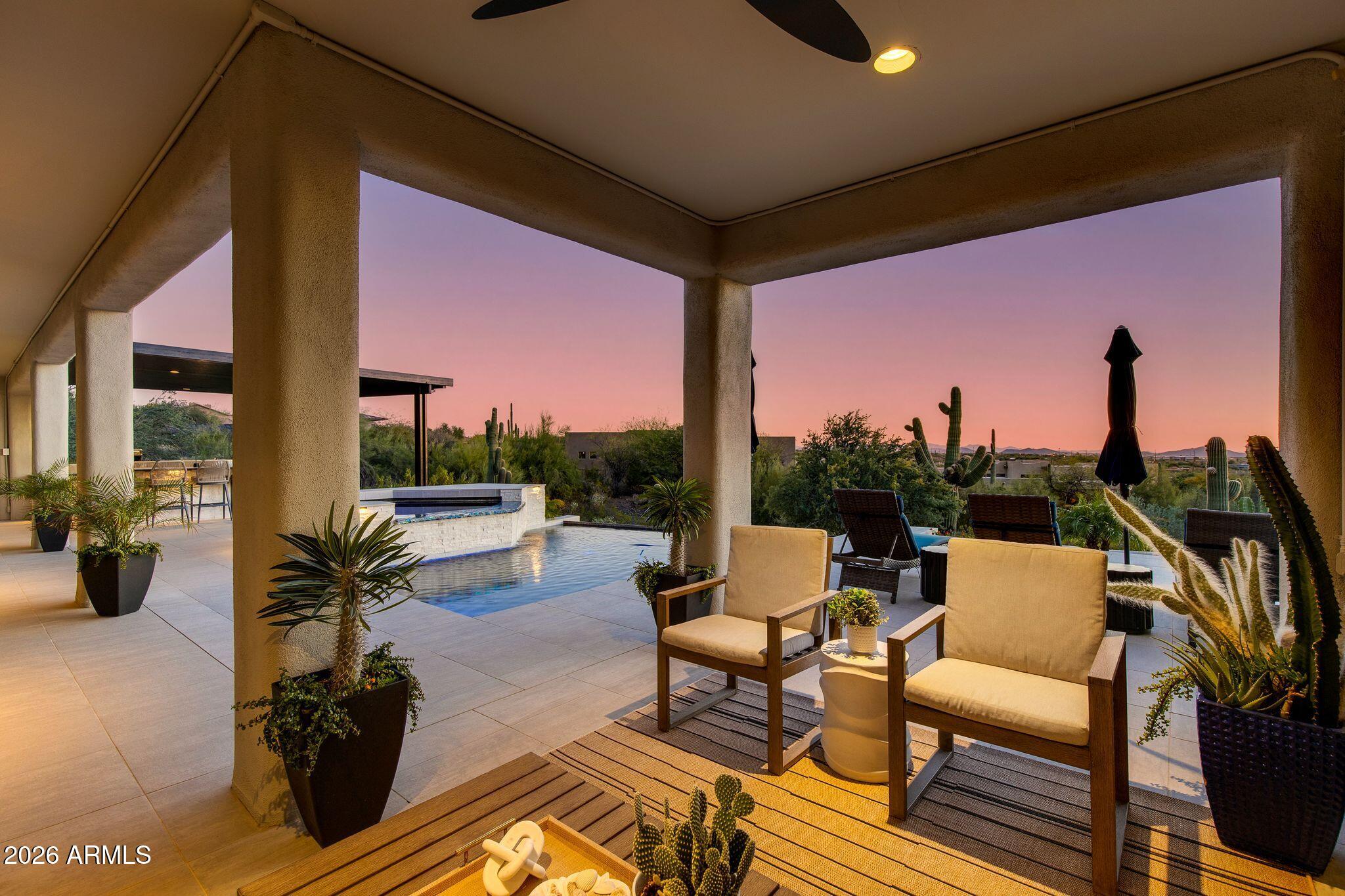 5901 East Restin Road Cave Creek, AZ 85331 - Photo 59 of 101 a building outdoor space with patio furniture