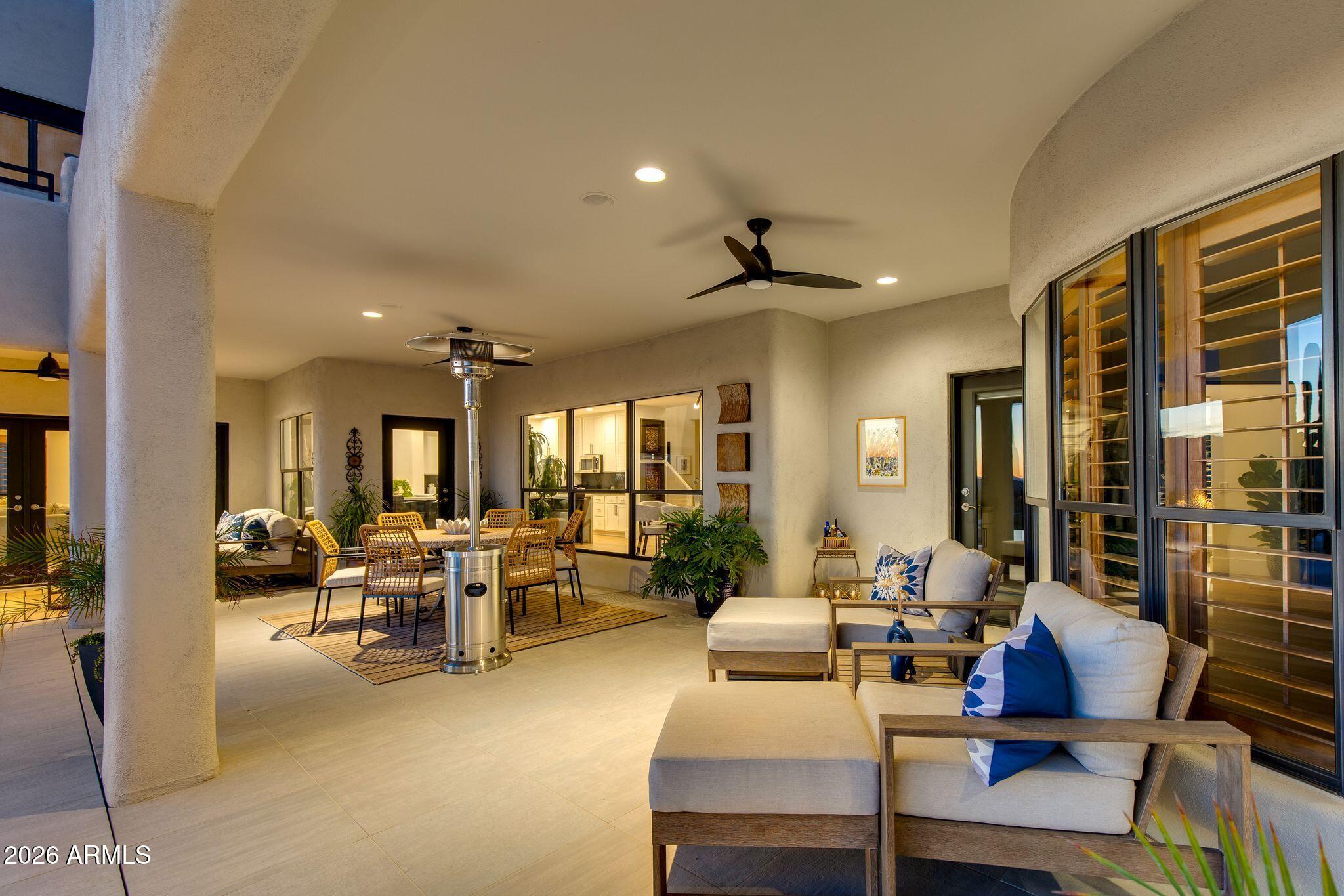 5901 East Restin Road Cave Creek, AZ 85331 - Photo 61 of 101 a living room with furniture and a large window