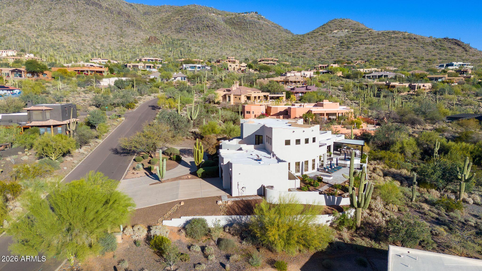 5901 East Restin Road Cave Creek, AZ 85331 - Photo 98 of 101 an aerial view of residential houses with outdoor space