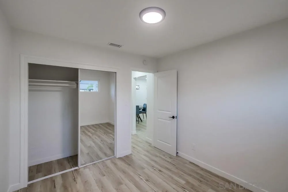 1839 Yettford Road Vista, CA 92083 - Photo 17 of 42 a view of entryway with wooden floor
