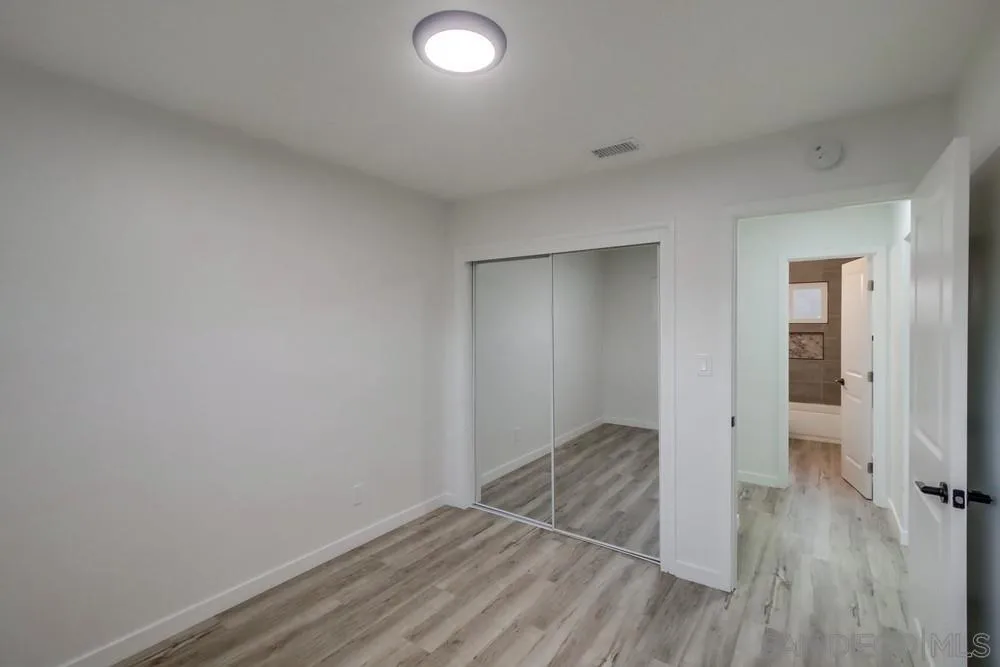1839 Yettford Road Vista, CA 92083 - Photo 18 of 42 a view of hallway with wooden floor