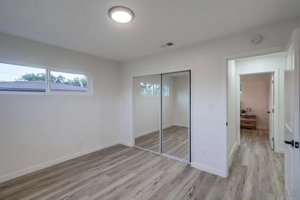 1839 Yettford Road Vista, CA 92083 - Photo 22 of 42 wooden floor in an empty room