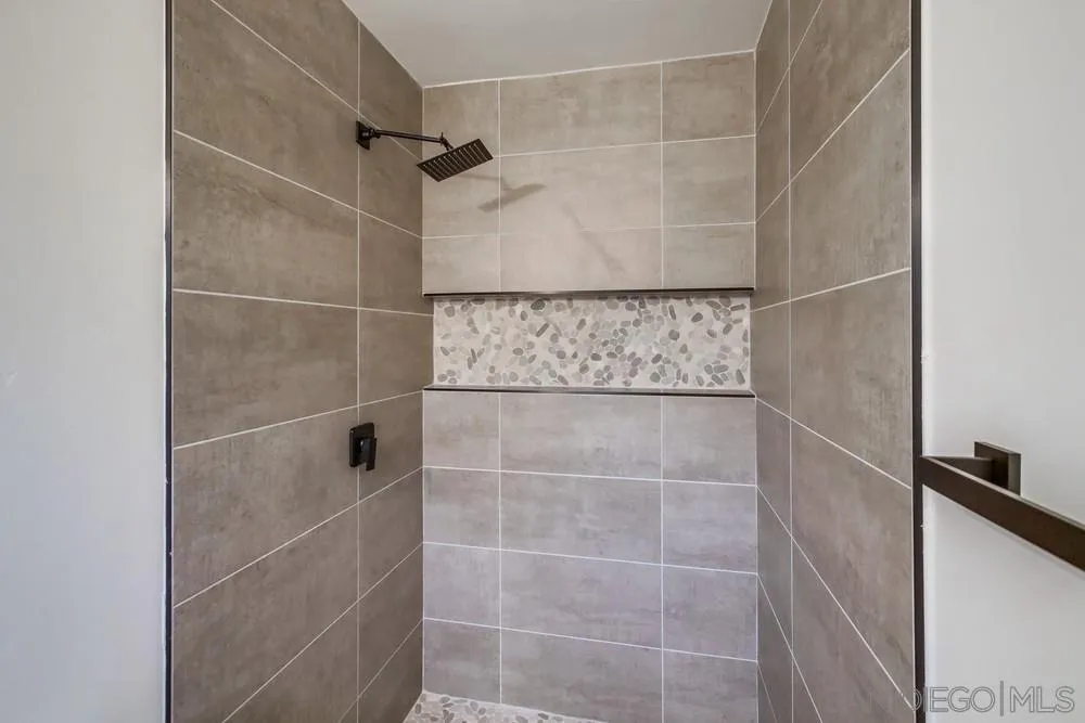 1839 Yettford Road Vista, CA 92083 - Photo 29 of 42 a bathroom with a shower