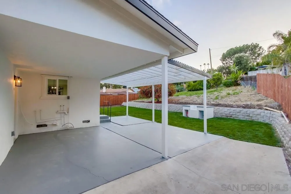 1839 Yettford Road Vista, CA 92083 - Photo 32 of 42 a view of an house with backyard and plants