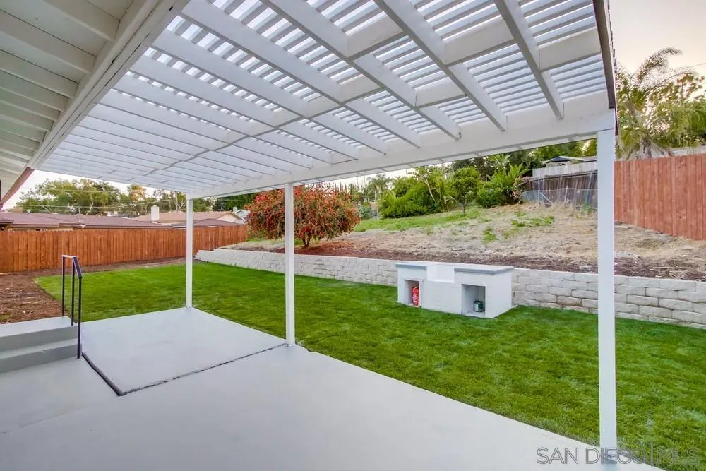 1839 Yettford Road Vista, CA 92083 - Photo 33 of 42 a view of a house with backyard and porch
