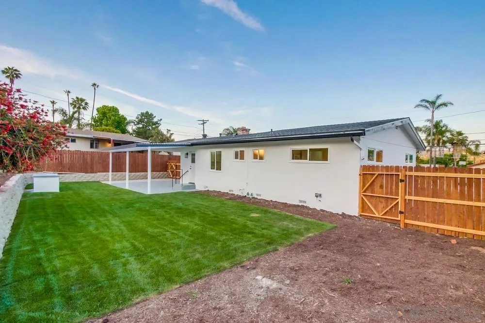 1839 Yettford Road Vista, CA 92083 - Photo 38 of 42 a view of backyard with a garden and deck