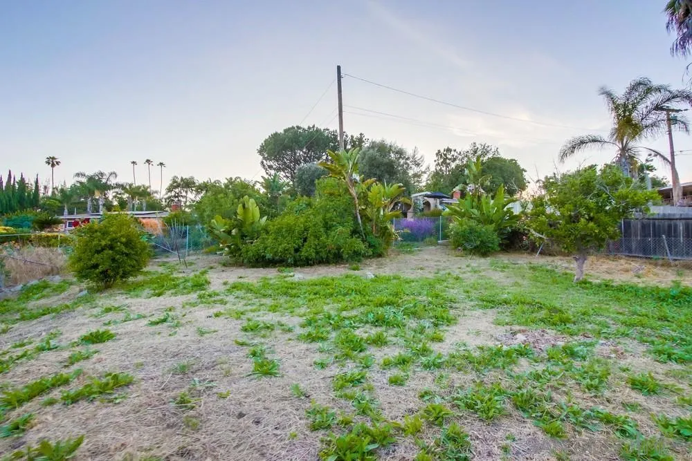 1839 Yettford Road Vista, CA 92083 - Photo 39 of 42 a green field with trees in the background