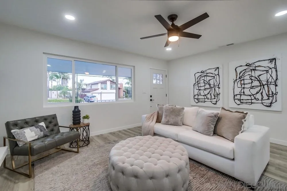 1839 Yettford Road Vista, CA 92083 - Photo 9 of 42 a living room with furniture and a large window