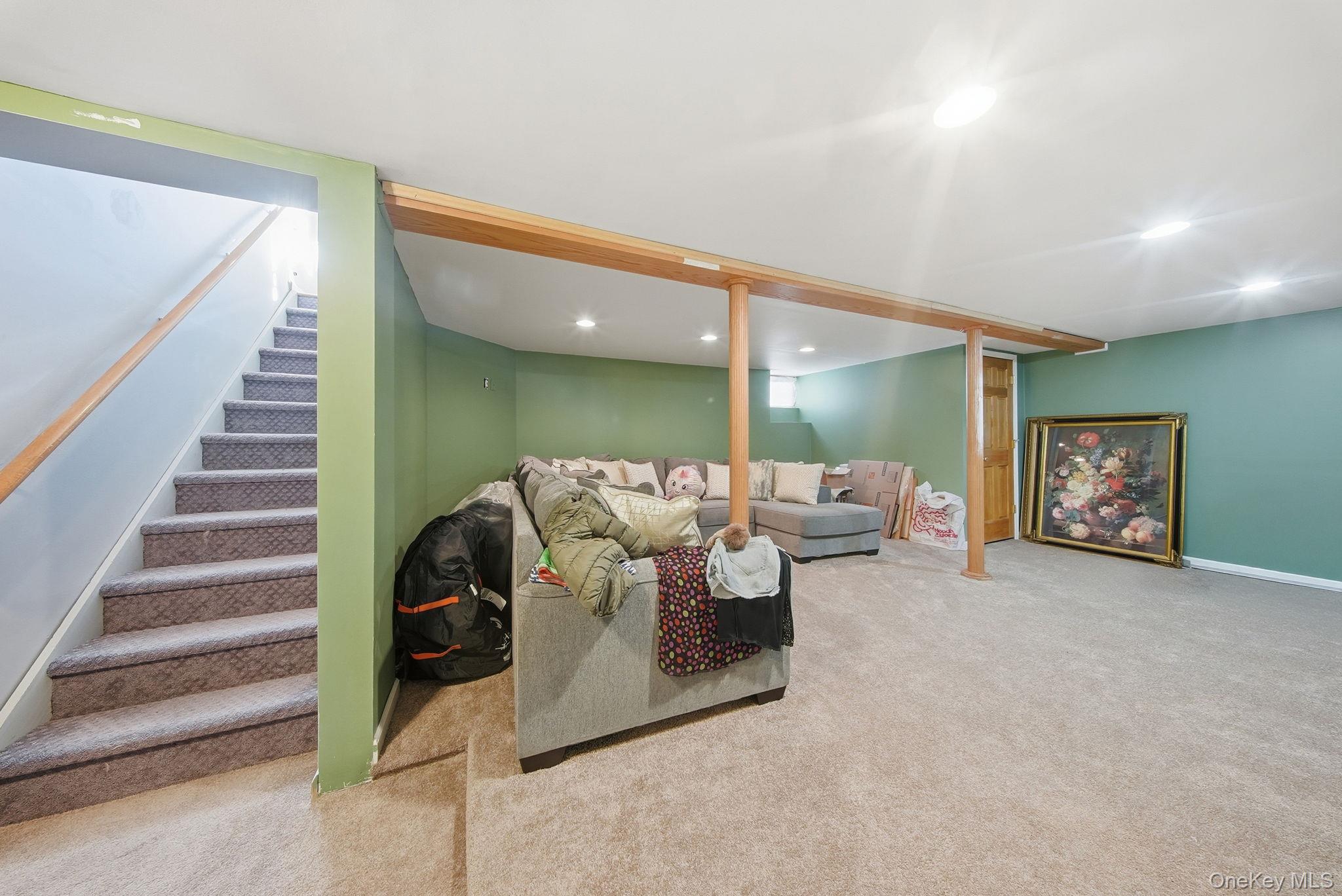 100 Maybrook Road Campbell Hall, NY 10916 - Photo 16 of 32 a living room with furniture and a fireplace