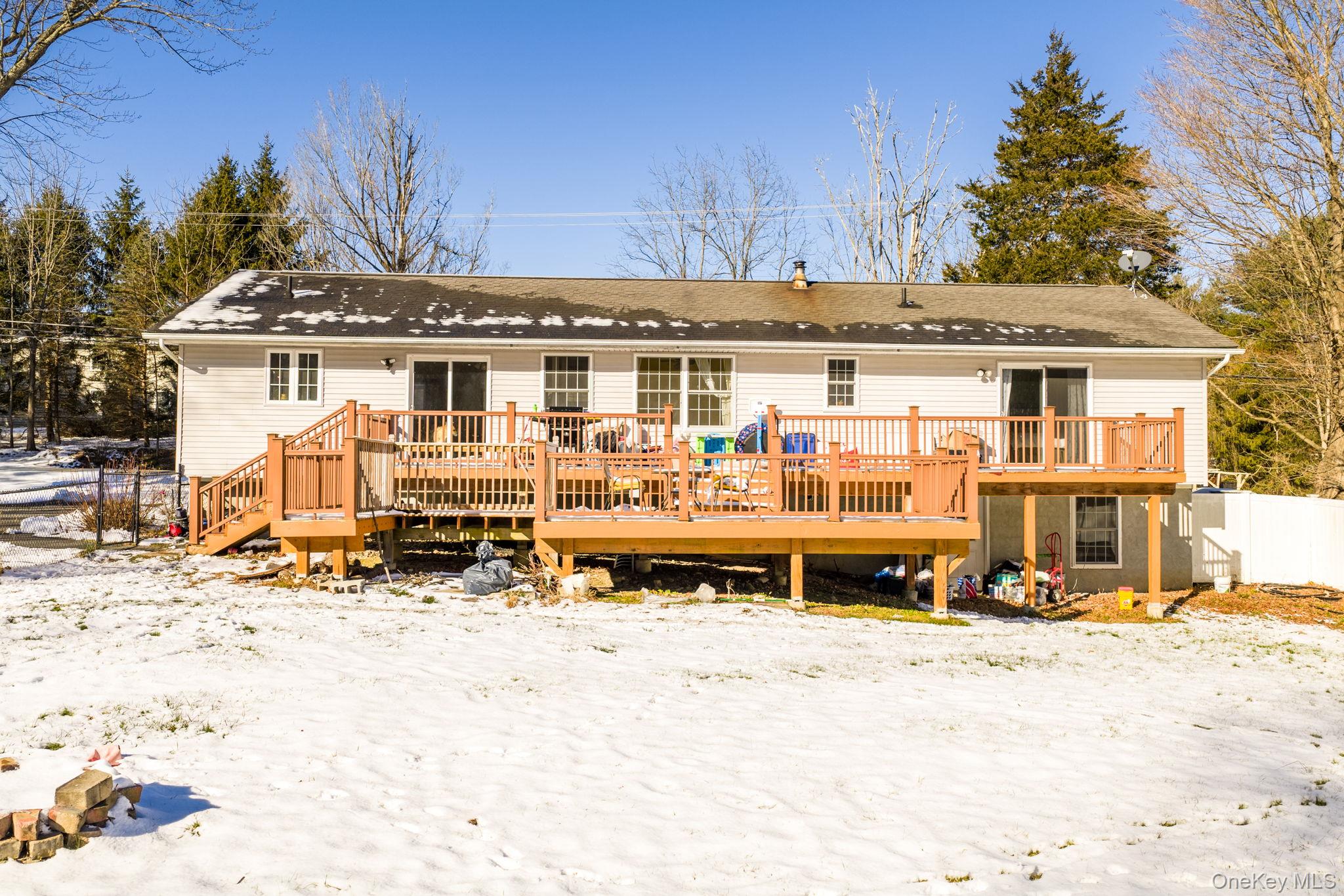 100 Maybrook Road Campbell Hall, NY 10916 - Photo 25 of 32 a view of a large white building with a large pool in the back yard
