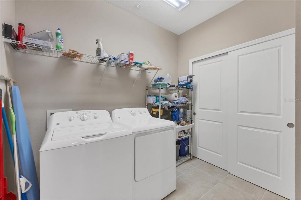 13703 Messina Loop, Unit 104 Bradenton, FL 34211 - Photo 27 of 86 a utility room with dryer and washer