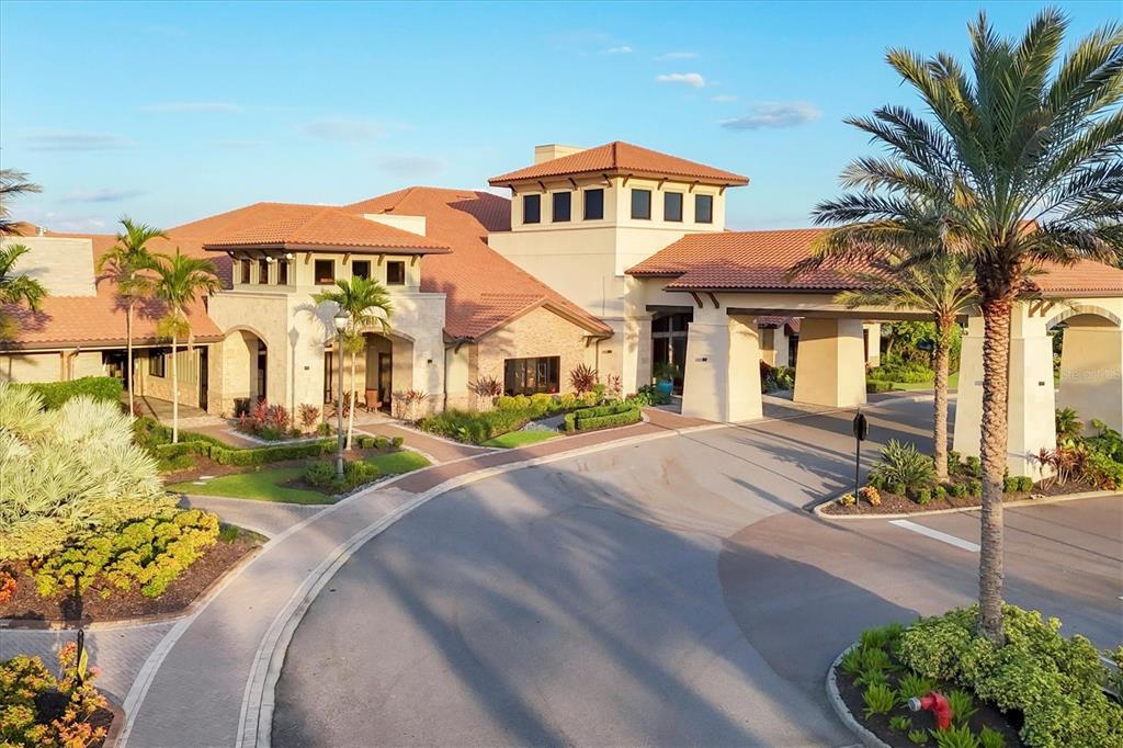 13703 Messina Loop, Unit 104 Bradenton, FL 34211 - Photo 43 of 86 a front view of a house with garden