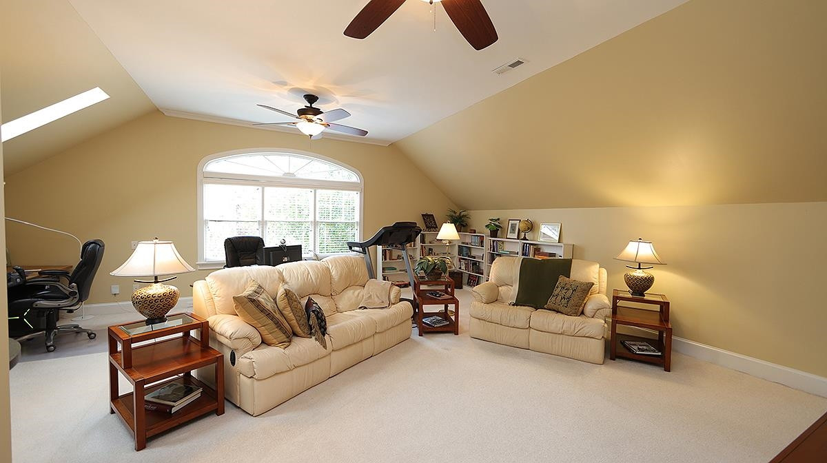 2000 Prescott Place Raleigh, NC 27615 - Photo 23 of 30 Bonus room has large Palladian window and features a wet bar Bonus Room