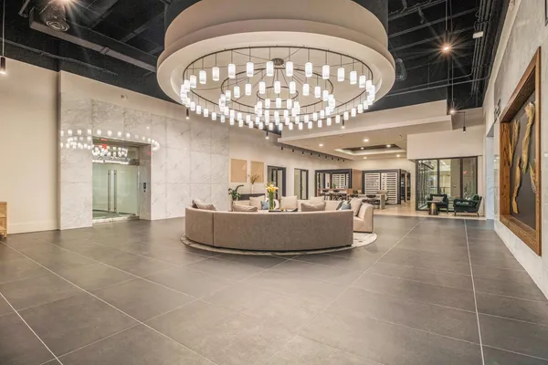 a room with furniture and flat screen tv