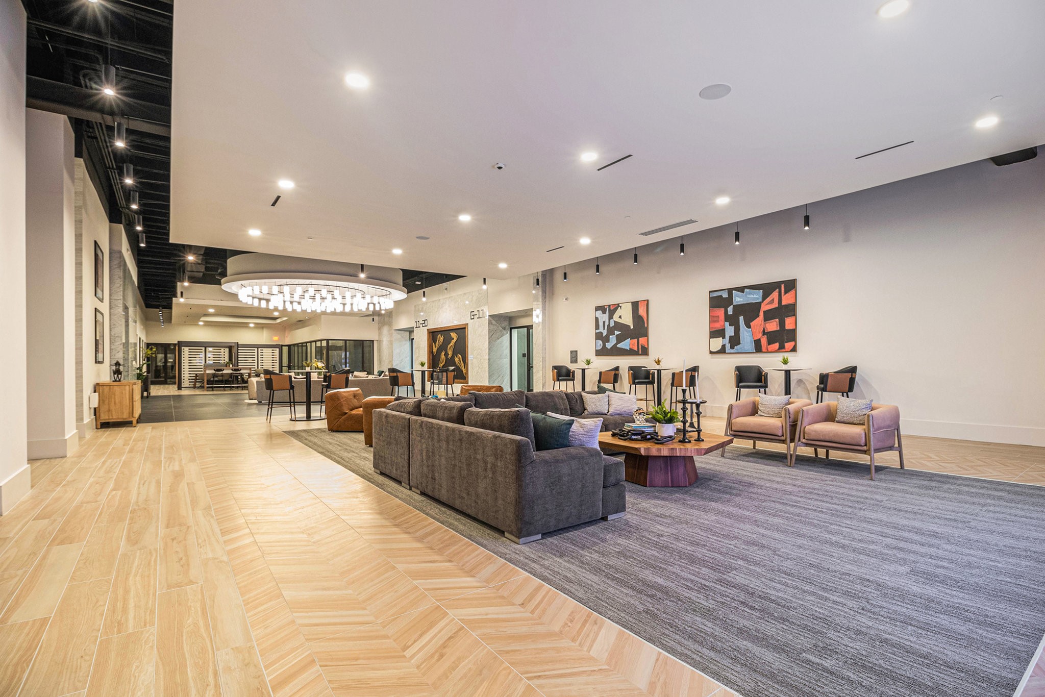 1801 Smith Street, Unit 2015 Houston, TX 77002 - Photo 19 of 28 a living room with furniture and a wooden floor