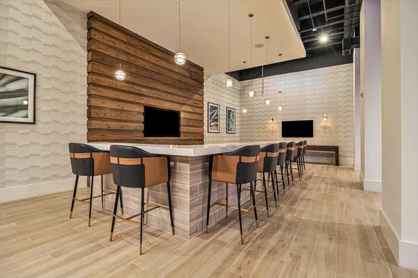 a view of game room with gym equipment