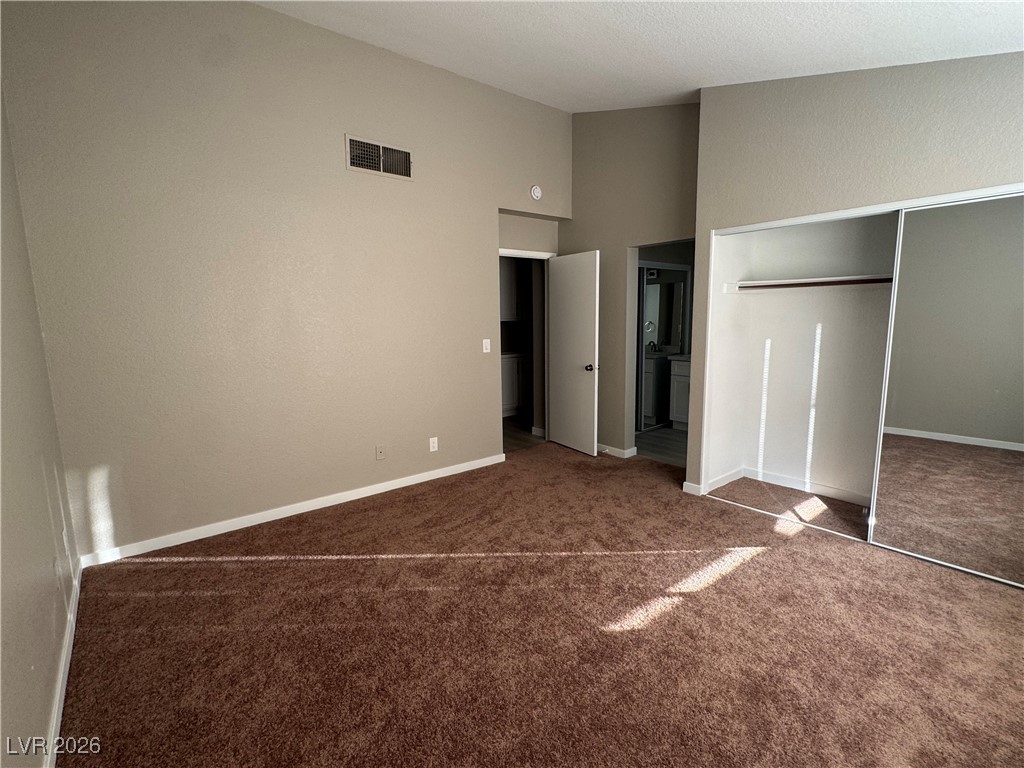 7447 Palermo Avenue Las Vegas, NV 89147 - Photo 9 of 26 Primary Bedroom and closet #1