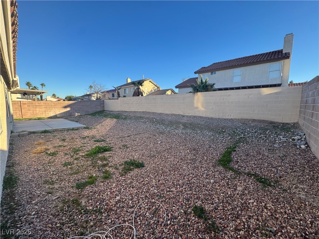 7447 Palermo Avenue Las Vegas, NV 89147 - Photo 19 of 26 Fenced backyard with a patio