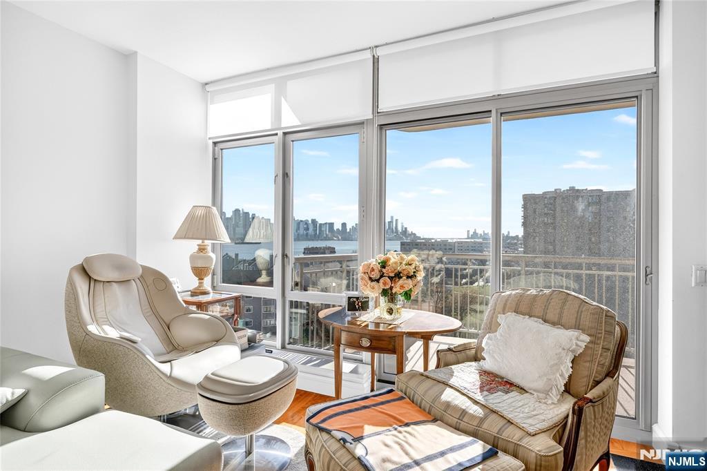 8100 River Road, Unit 801 North Bergen, NJ 07047 - Photo 11 of 48 a living room with furniture and a window