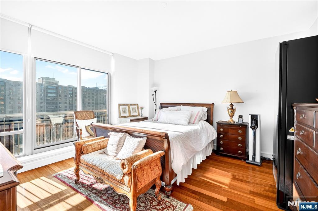 8100 River Road, Unit 801 North Bergen, NJ 07047 - Photo 28 of 48 a bed room with a bed and a television