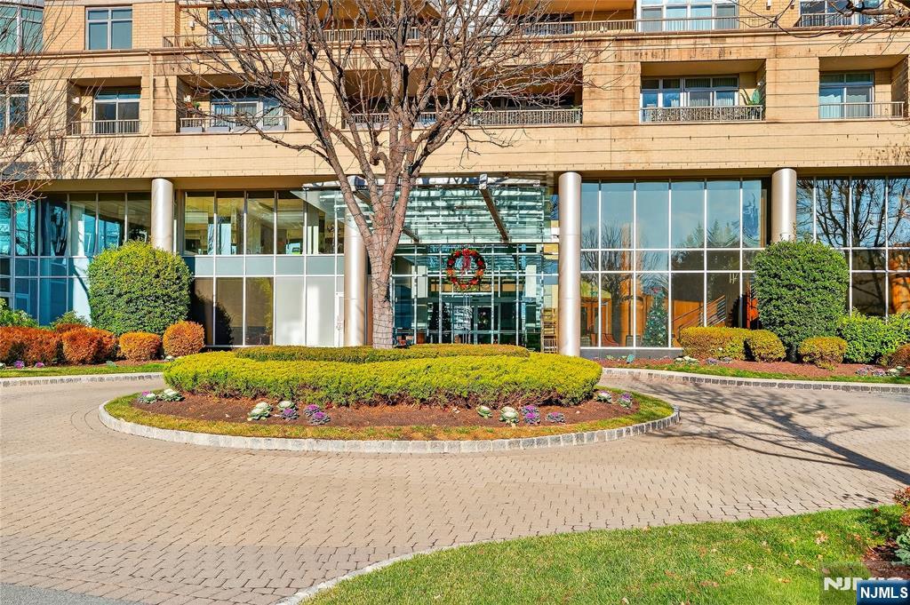 8100 River Road, Unit 801 North Bergen, NJ 07047 - Photo 4 of 48 a front view of a house with a yard