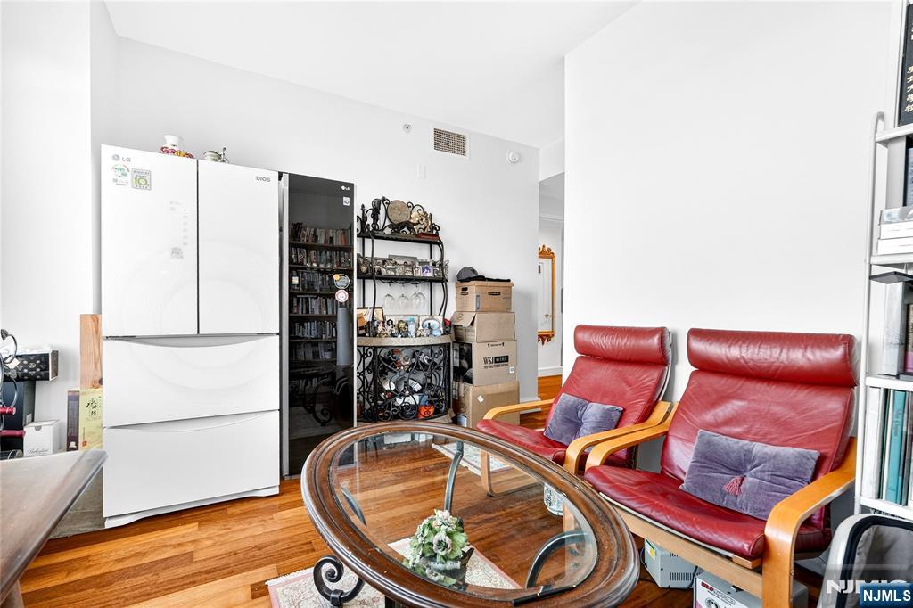 8100 River Road, Unit 801 North Bergen, NJ 07047 - Photo 47 of 48 a room with furniture and a rug