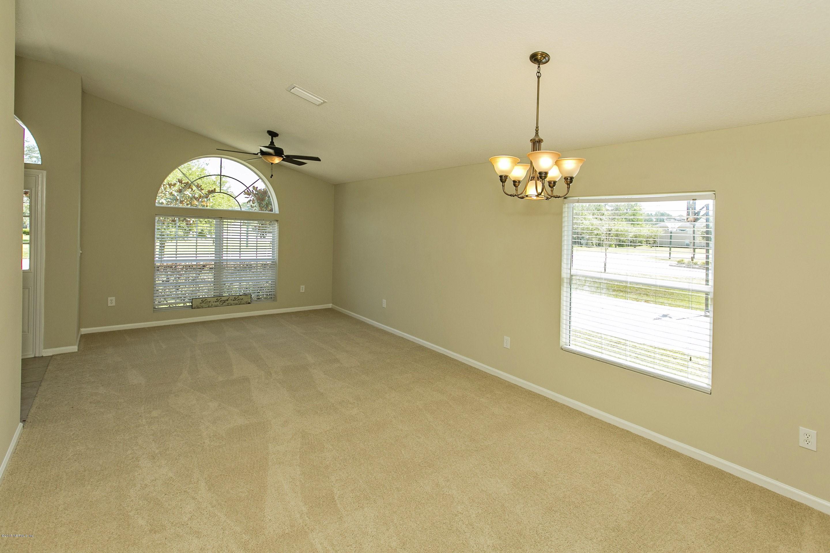 805 Crystal Spring Way St. Augustine, FL 32092 - Photo 6 of 30 006_Dining & Living Room