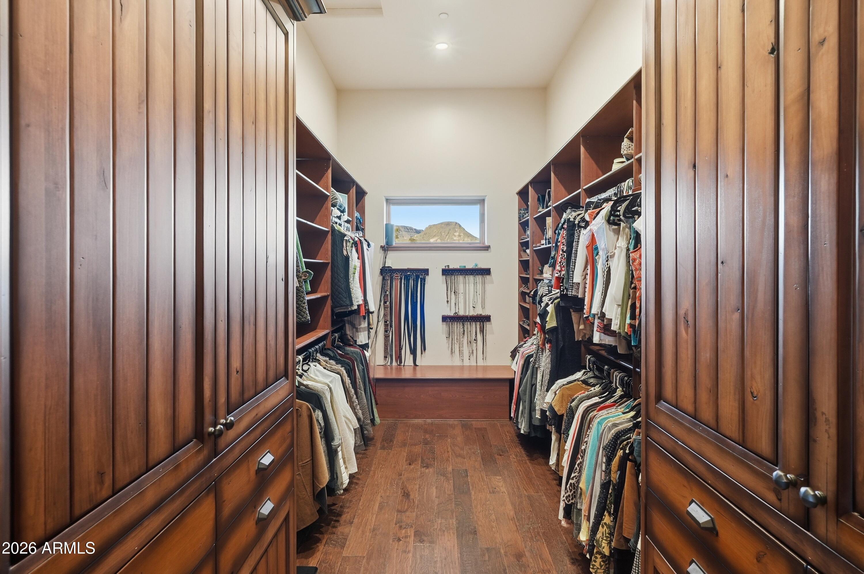 42531 North Spur Cross Road Cave Creek, AZ 85331 - Photo 24 of 75 a view of walk in closet with clothes and shoes