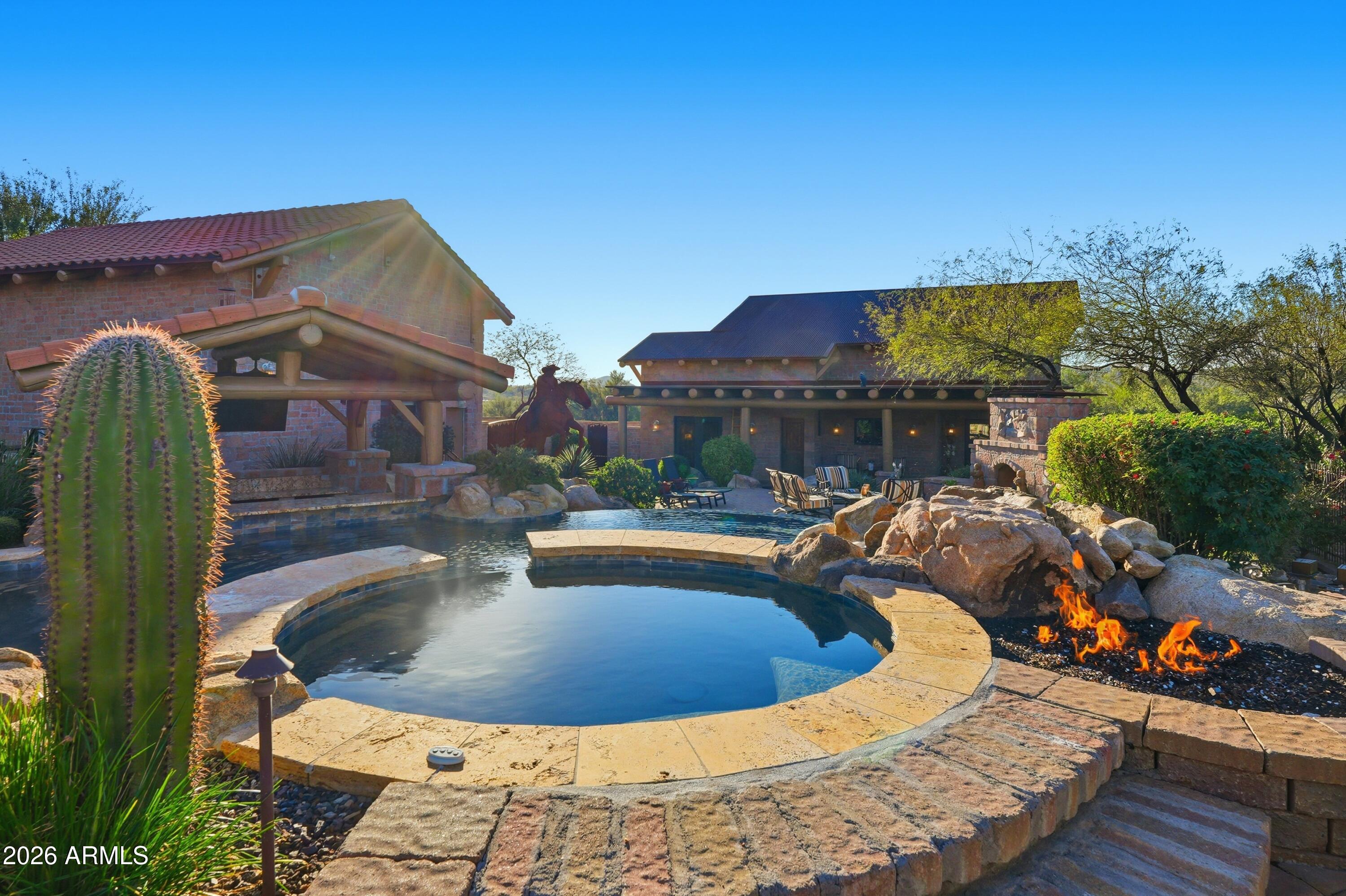 42531 North Spur Cross Road Cave Creek, AZ 85331 - Photo 34 of 75 a view of a swimming pool with sitting area