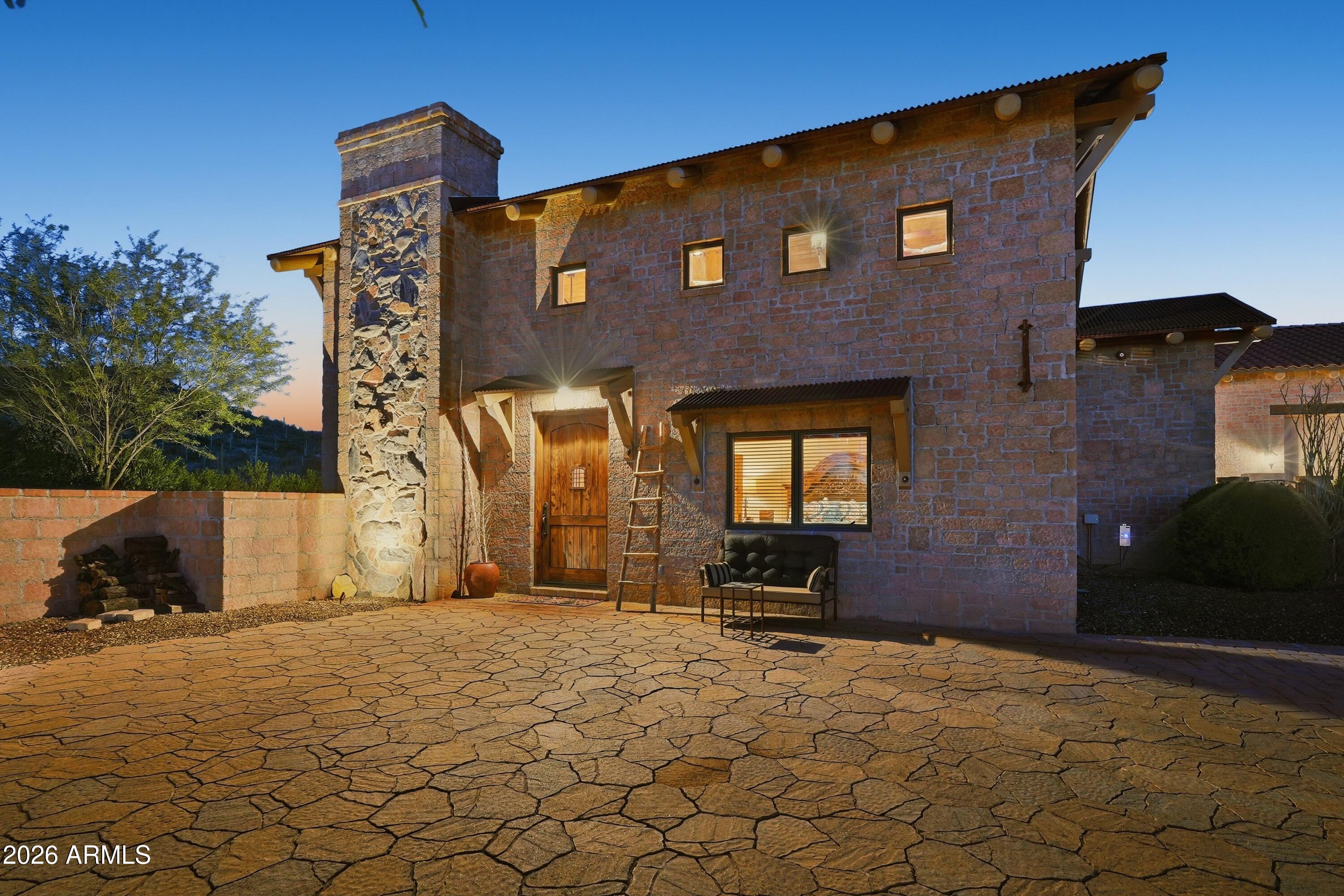 42531 North Spur Cross Road Cave Creek, AZ 85331 - Photo 45 of 75 a front view of a house with a yard