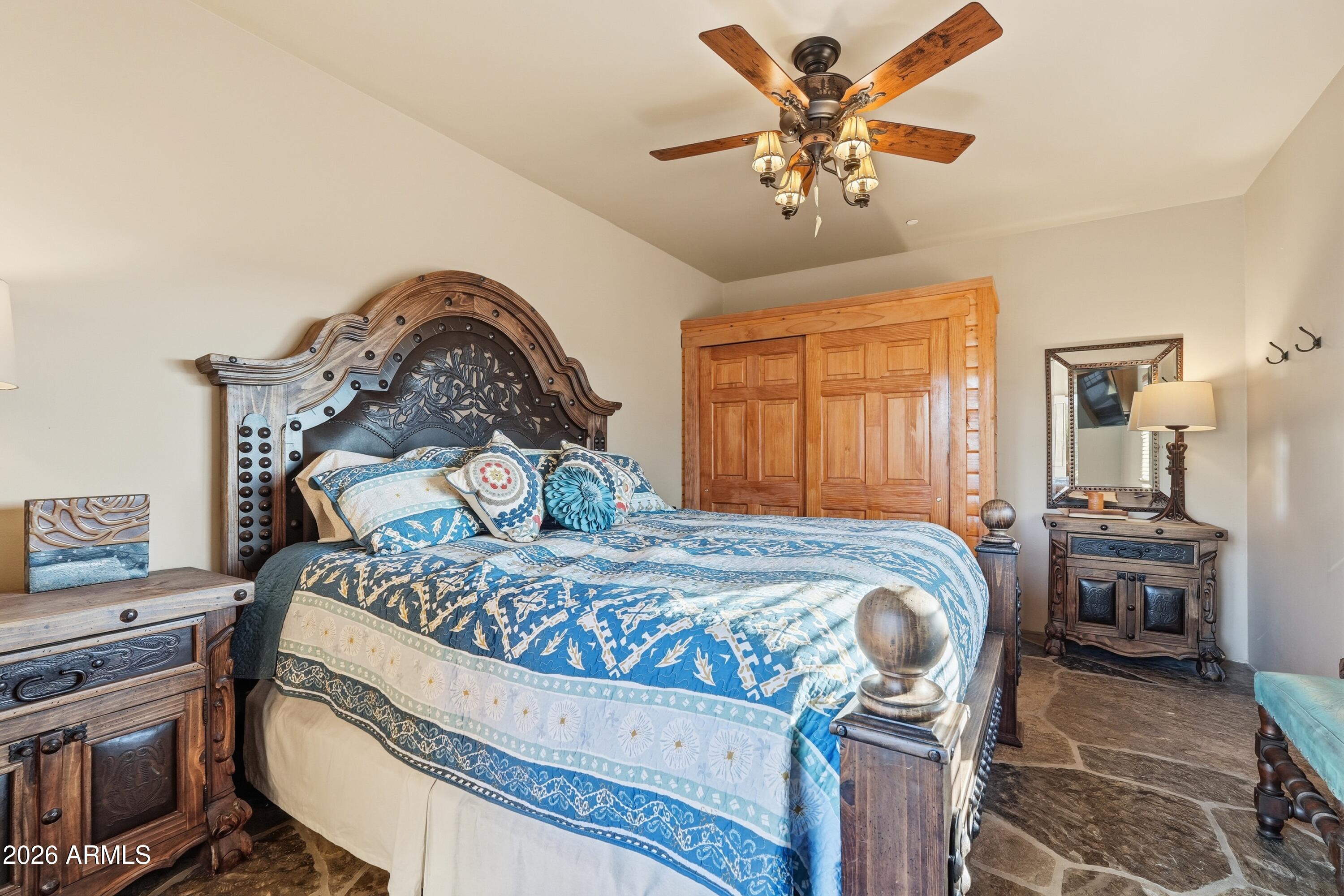 42531 North Spur Cross Road Cave Creek, AZ 85331 - Photo 53 of 75 a bed sitting in a bedroom next to a window
