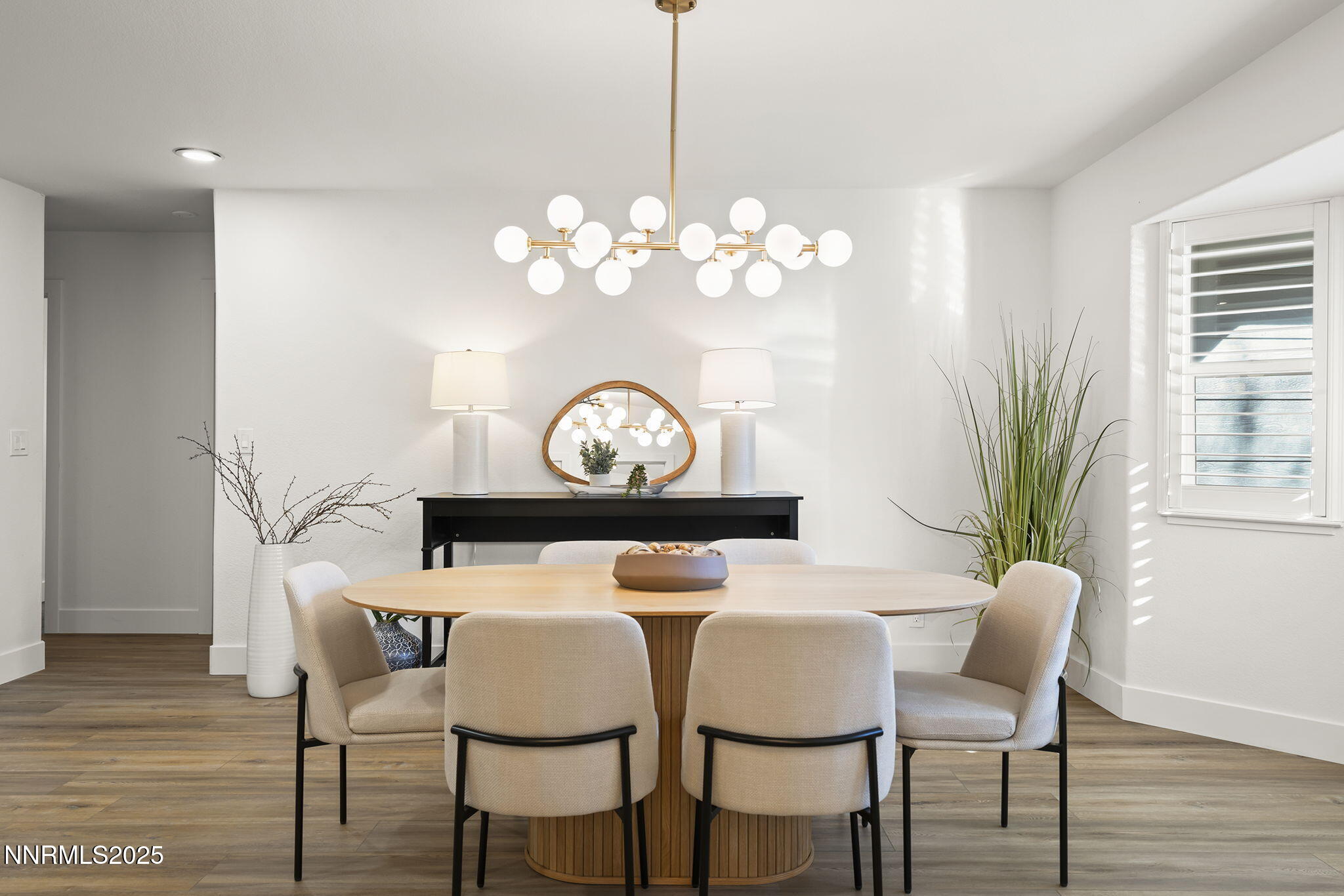 1855 Hunter Lake Drive Reno, NV 89509 - Photo 11 of 37 a view of a dining room with furniture and wooden floor