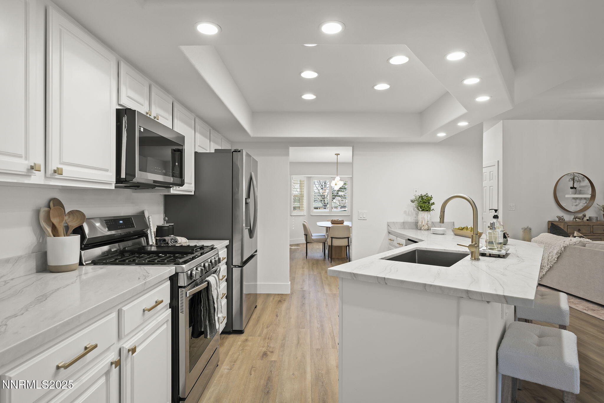1855 Hunter Lake Drive Reno, NV 89509 - Photo 16 of 37 a kitchen with sink a stove and refrigerator