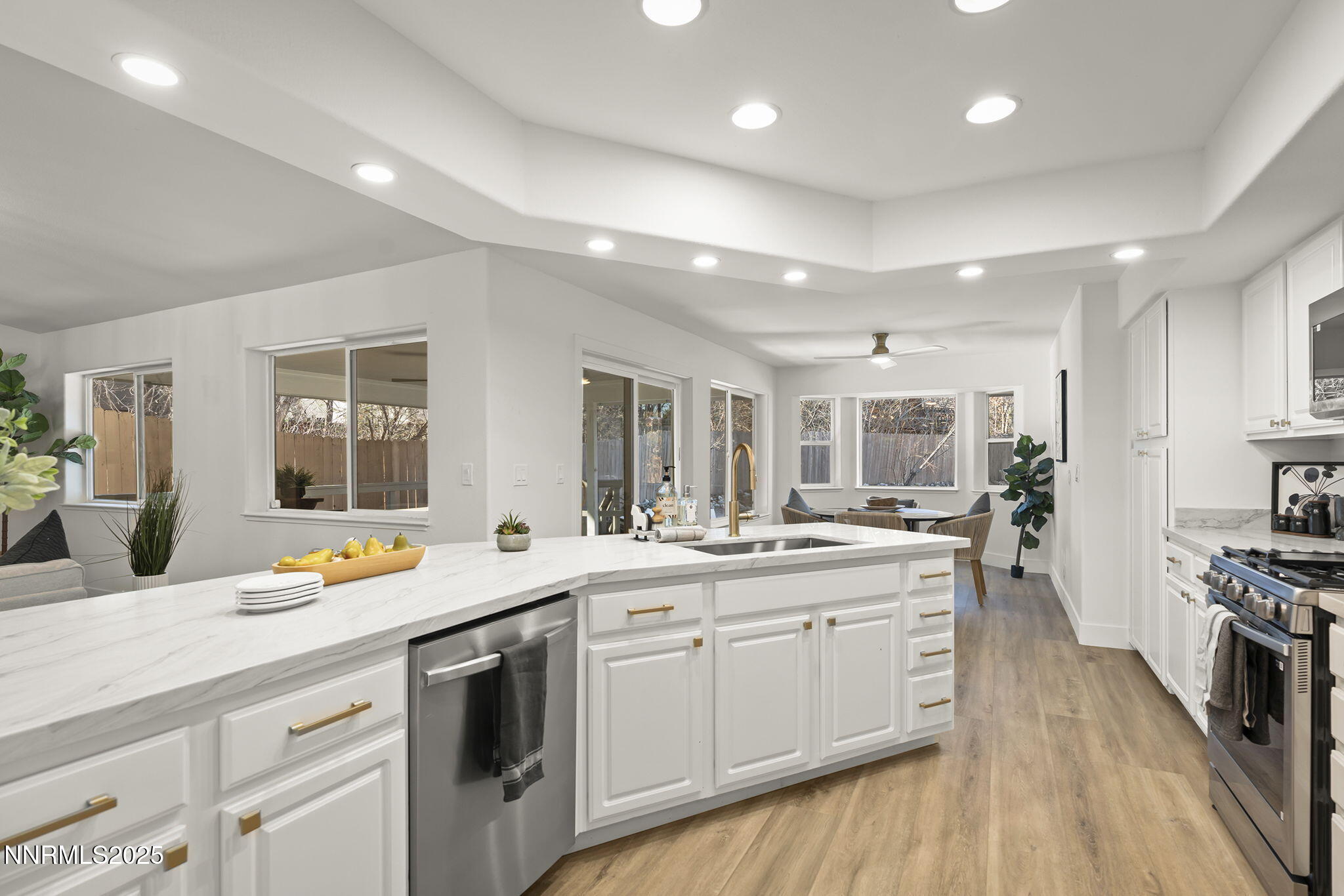1855 Hunter Lake Drive Reno, NV 89509 - Photo 17 of 37 a kitchen with a sink stove and cabinets