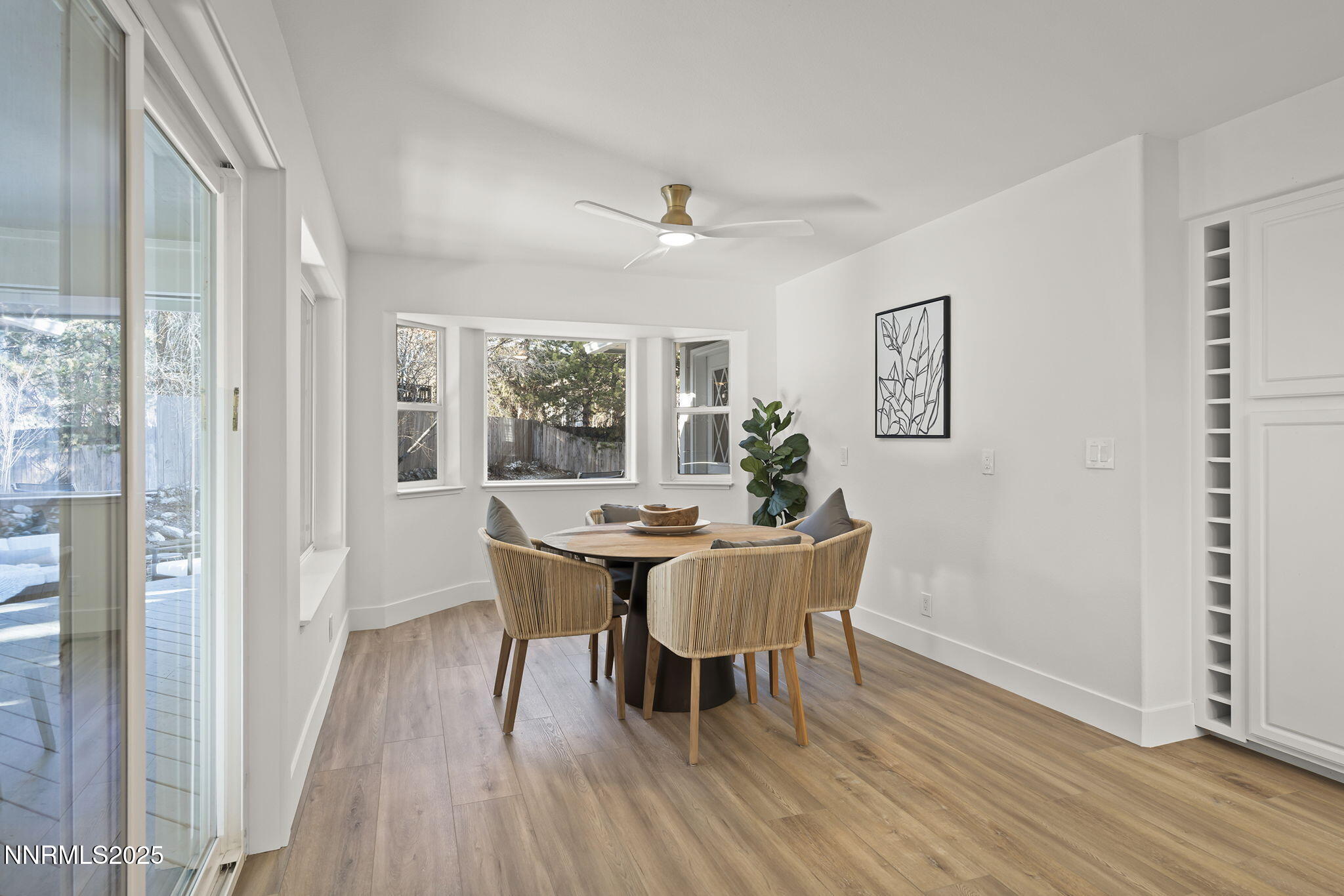 1855 Hunter Lake Drive Reno, NV 89509 - Photo 18 of 37 a view of a dining room with furniture window and wooden floor