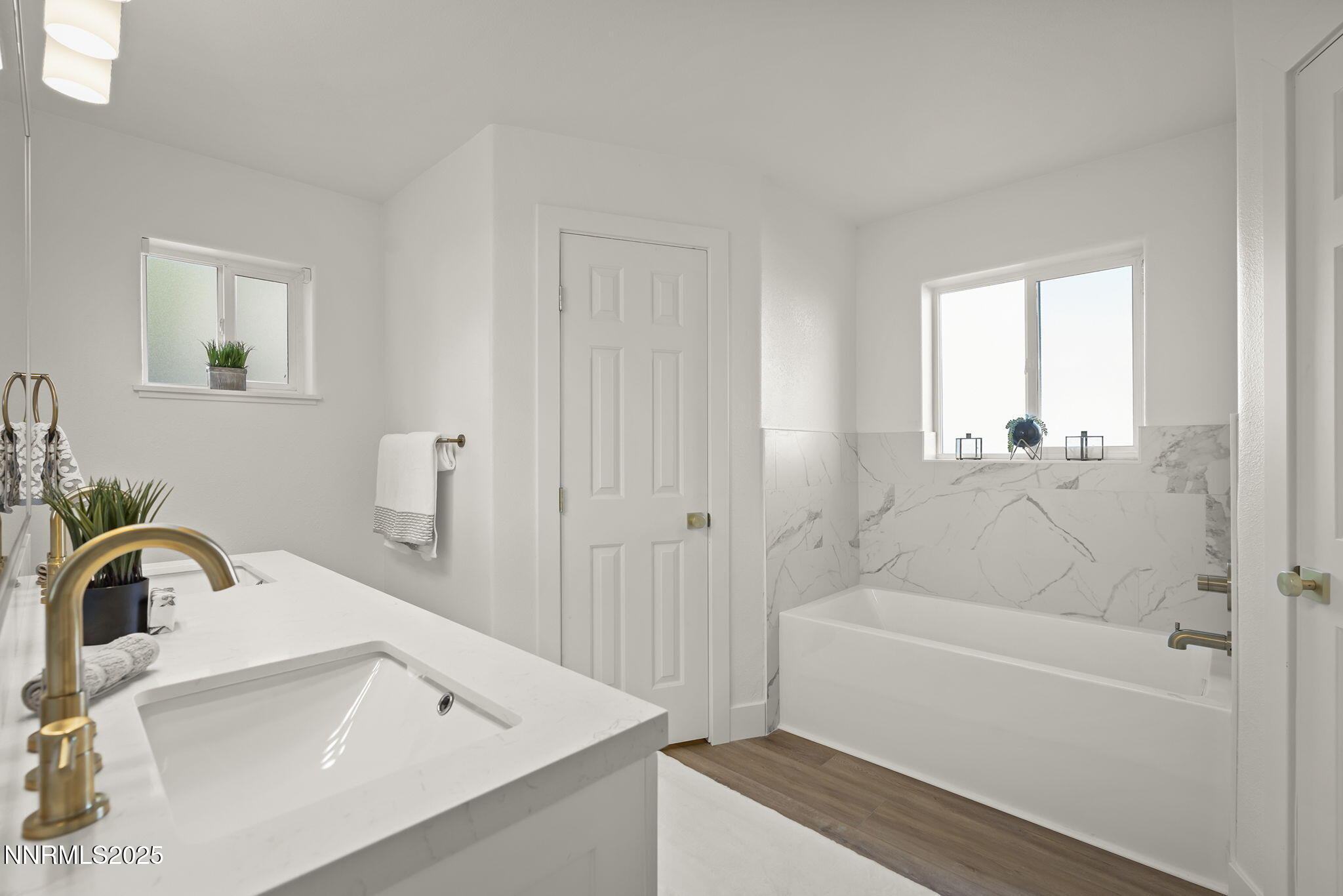 1855 Hunter Lake Drive Reno, NV 89509 - Photo 22 of 37 a bathroom with a sink and a bathtub