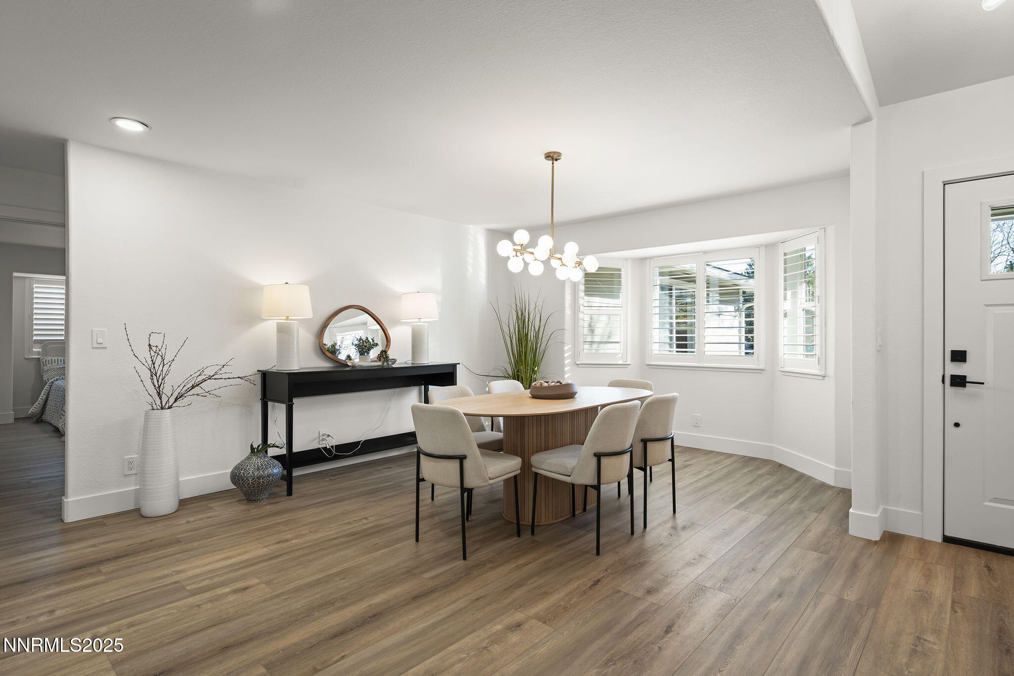 1855 Hunter Lake Drive Reno, NV 89509 - Photo 9 of 37 a view of a dining room with furniture window and wooden floor