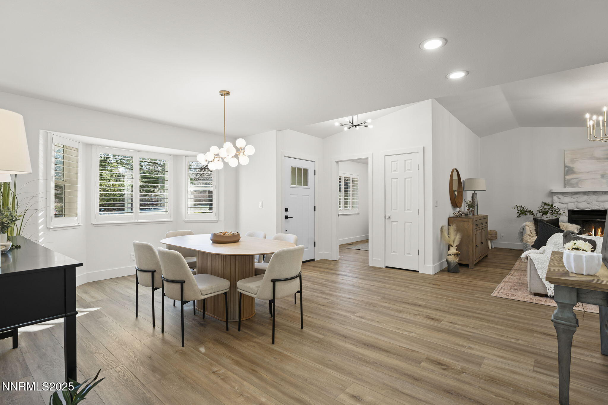 1855 Hunter Lake Drive Reno, NV 89509 - Photo 10 of 37 a view of a dining room with furniture window and wooden floor