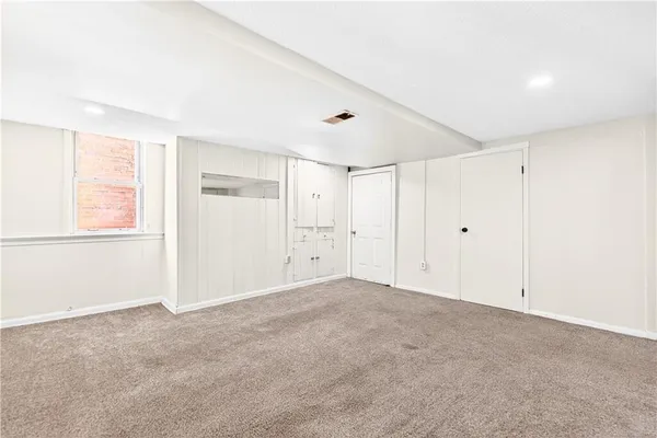 a view of a bedroom with closet