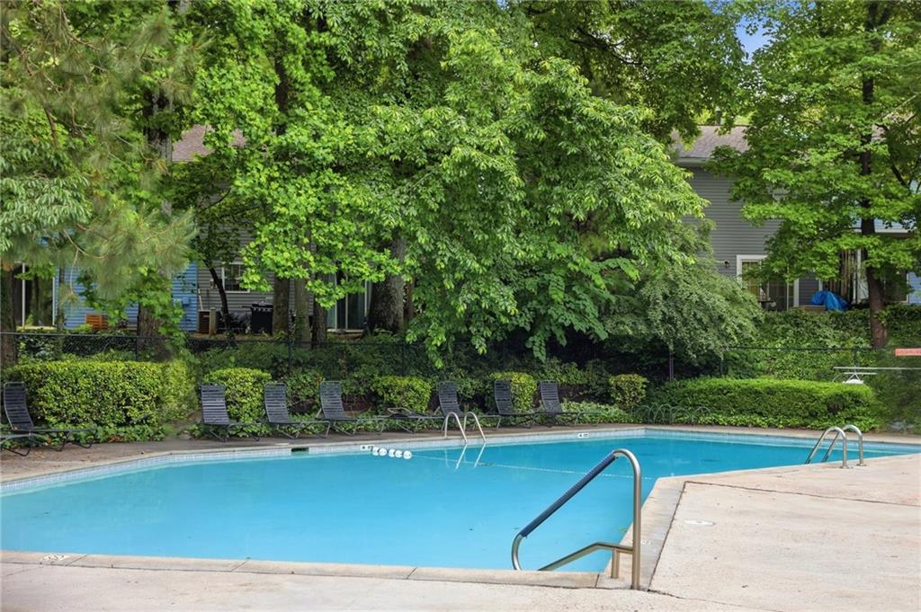 413 Promenade Court Marietta, GA 30064 - Photo 24 of 28 a view of a swimming pool with a patio