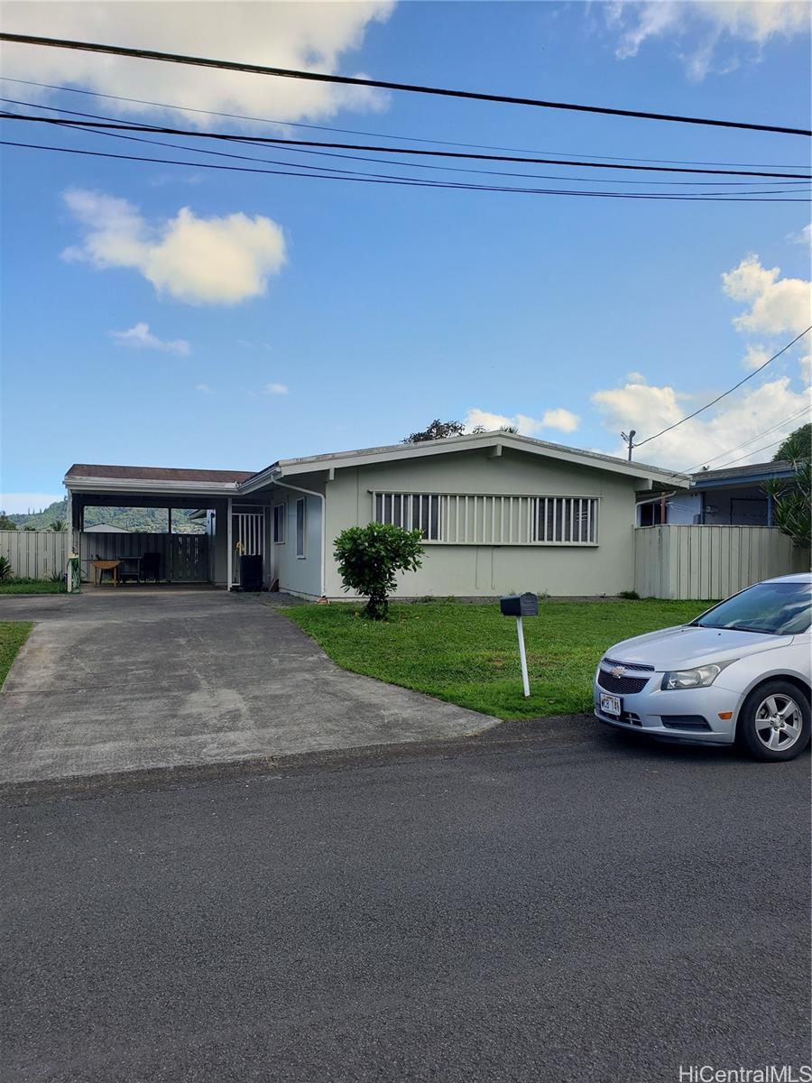 45-723 Anoi Road Kaneohe, HI 96744 - Photo 1 of 1 a front view of a house with a yard