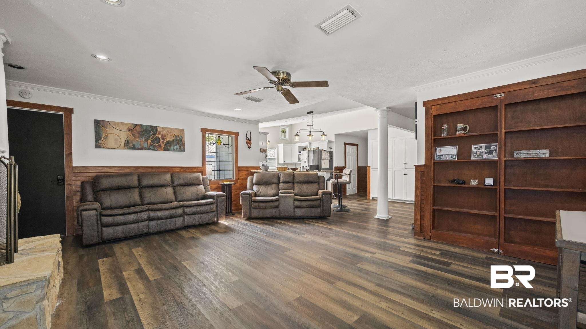 12855 Woodhaven Dairy Road West Silverhill, AL 36576 - Photo 14 of 27 Living room with dark wood-style floors, ornamental molding, ceiling fan, decorative columns, and recessed lighting