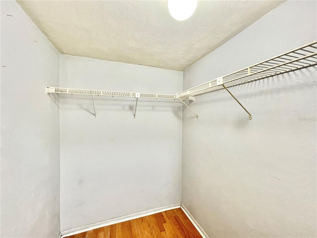 719 Southwest 75th Street, Unit 103 Gainesville, FL 32607 - Photo 17 of 39 a view of a room with racks on the wall