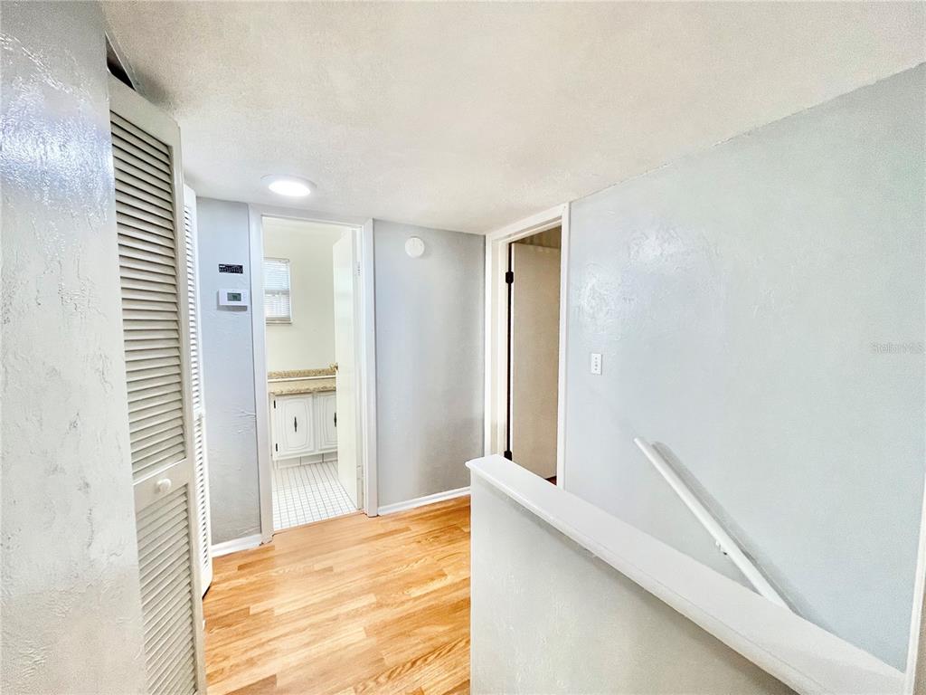 719 Southwest 75th Street, Unit 103 Gainesville, FL 32607 - Photo 22 of 39 a view of an empty room and window